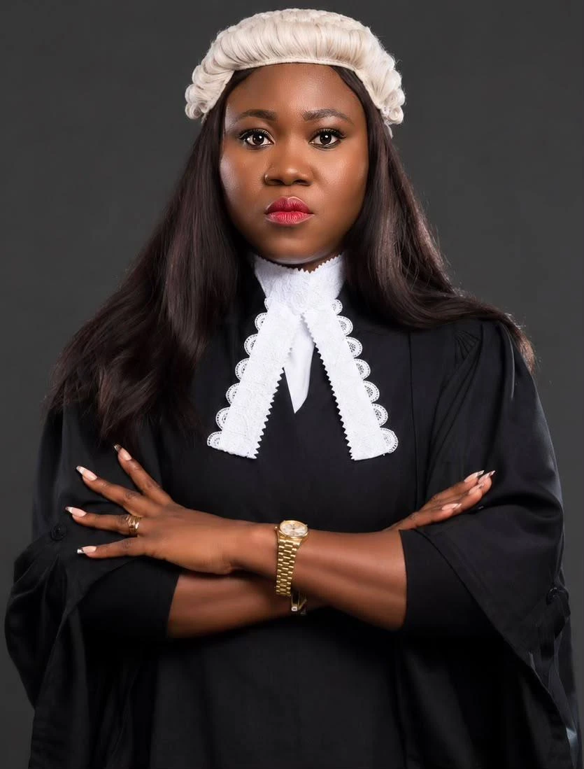 Portrait of Ama Nupe Demuyakor, Esq in barrister’s wig and gown